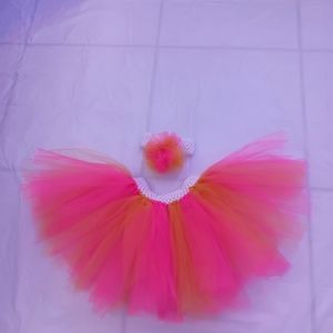 Tutu with hair band. Size 3-4 years old. Color golden and pink.